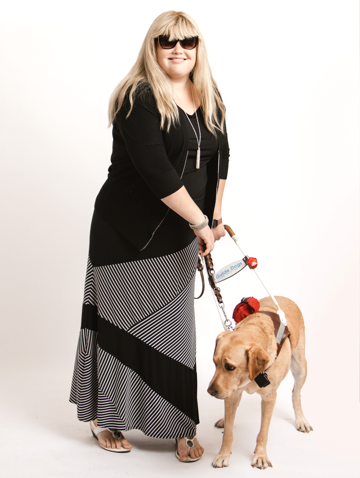 Image of Alisa with her guide dog.